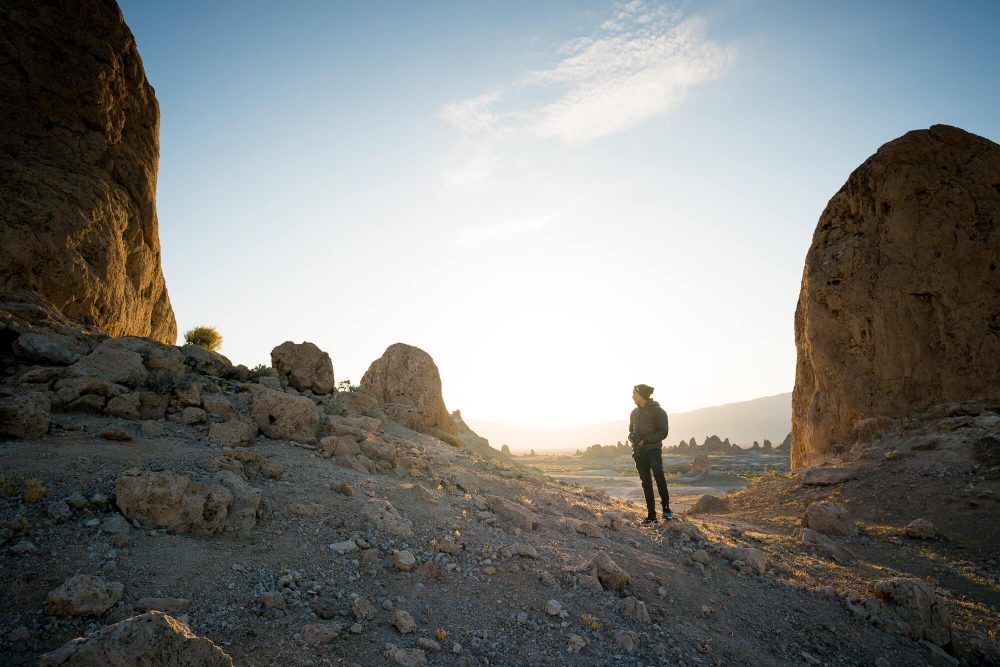 tyler minney admiring sunrise at trona pinnacles | photo by jake landon schwartz