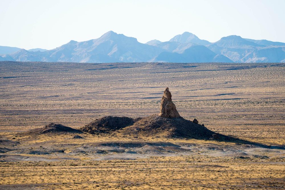 trona pinnacles and background mountains in the morning shot with sony 100-400 gm and sony a7rii | photo by jake landon schwartz